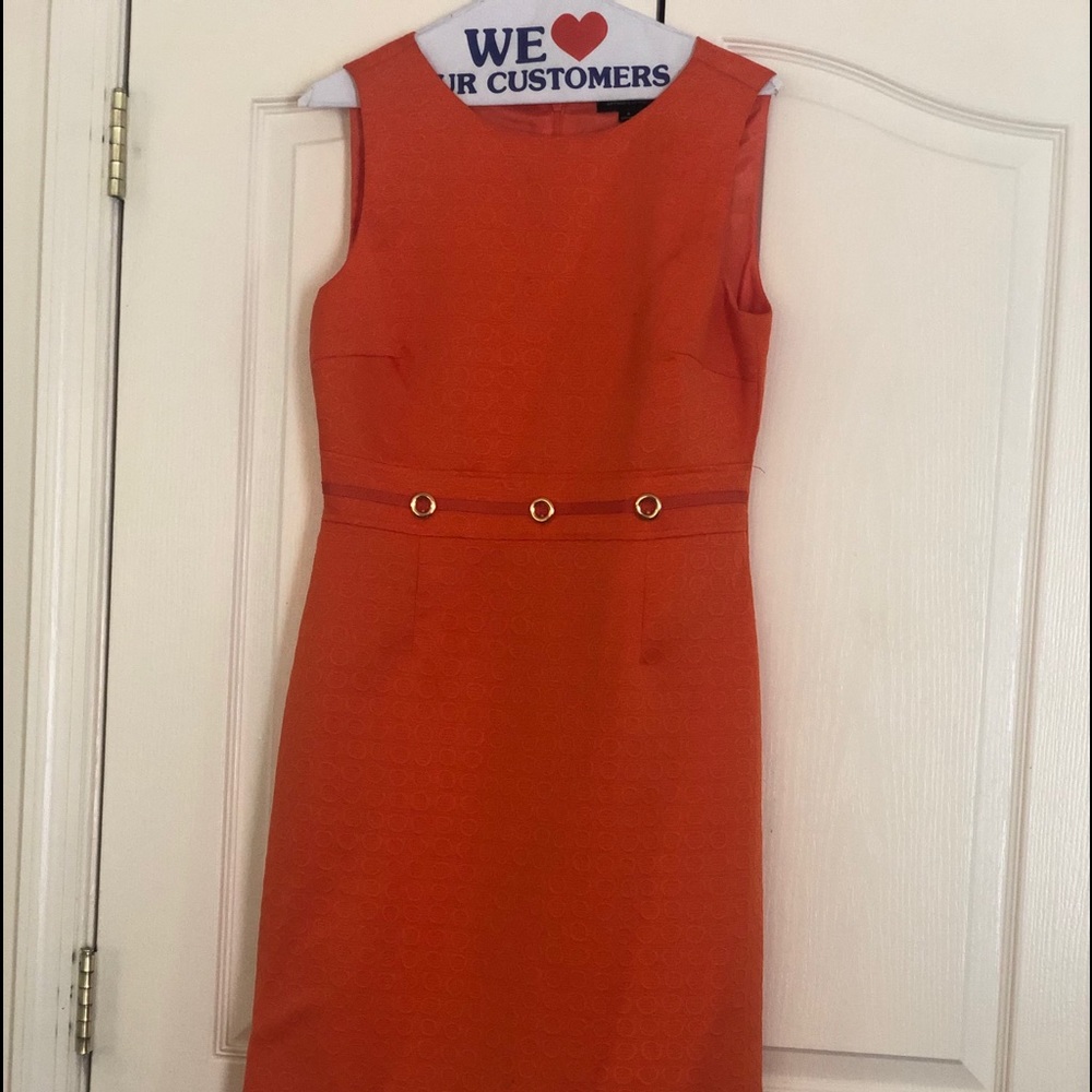 Tahari bright orange dress.